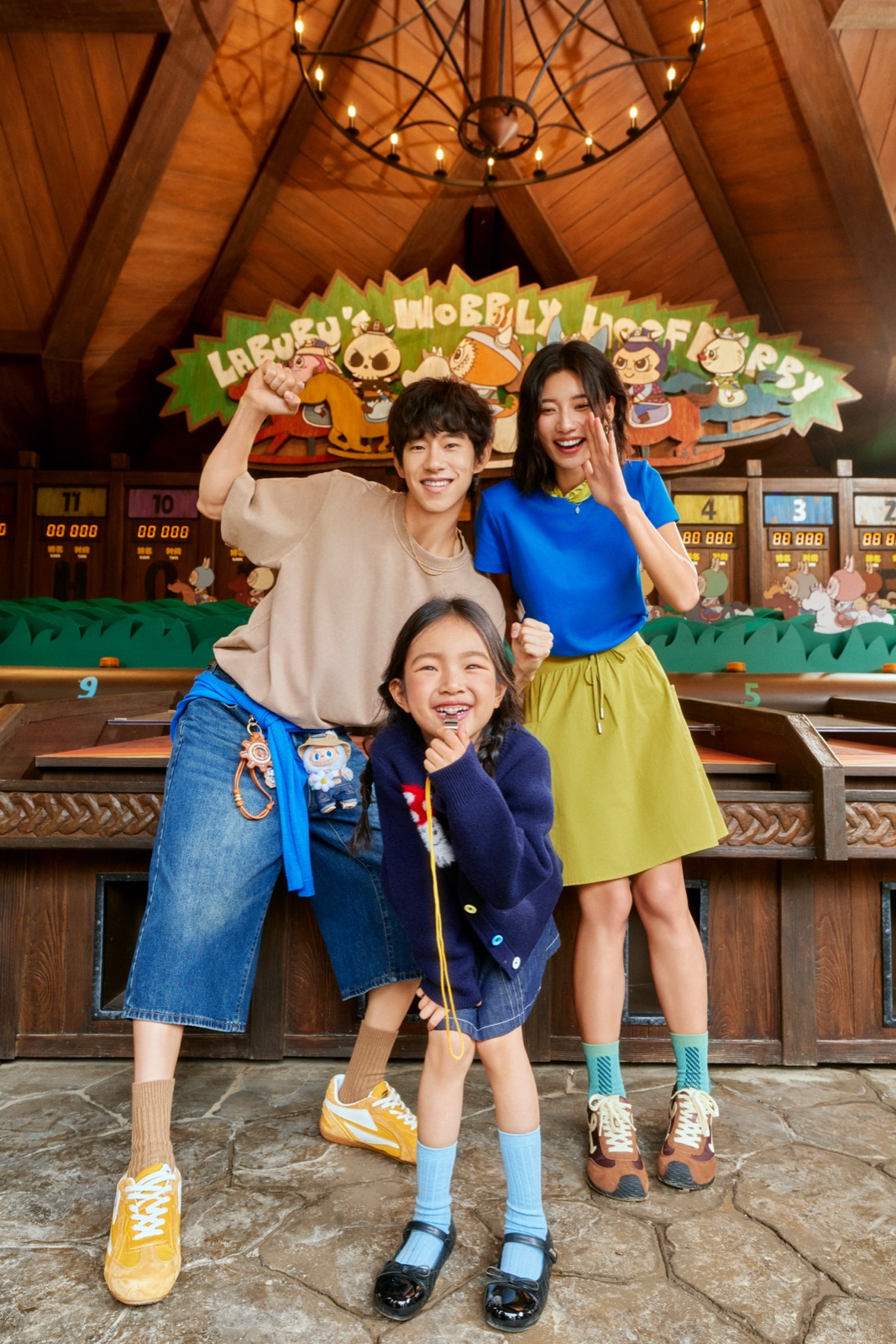 A family at a carnival game booth